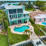 Waterfront Luxury W/ Heated Salt Pool & Golf Cart