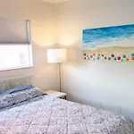 Sun, Sand, Coastal Haven 1