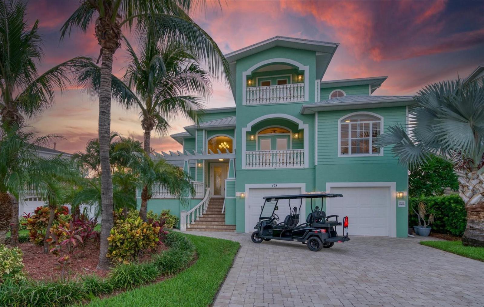Waterfront Luxury W/ Heated Salt Pool & Golf Cart Holiday home