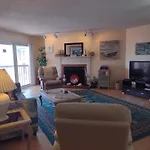 Tropical Beachfront Penthouse-Beach Cottages II